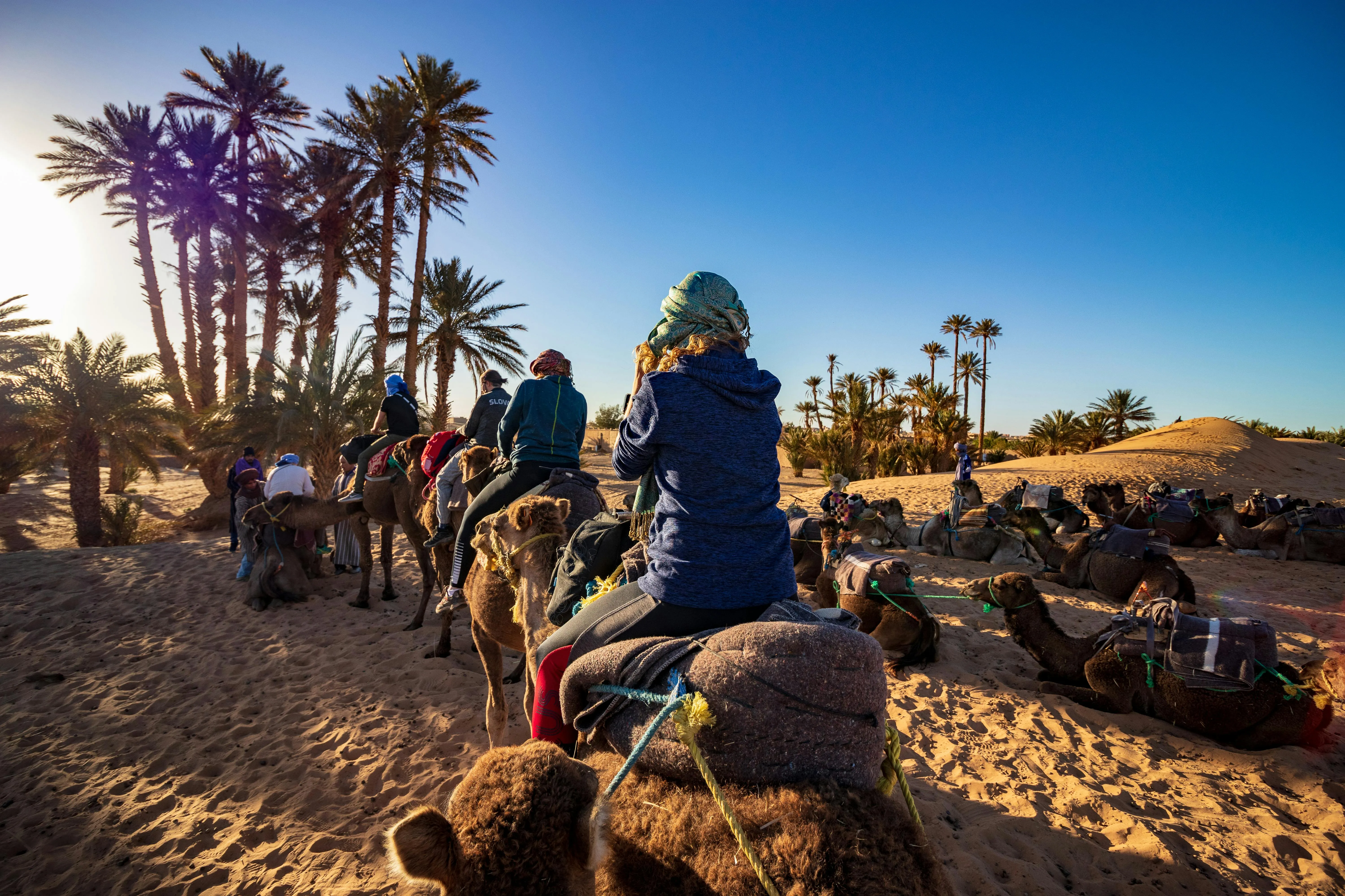 Camel trek through the Timelaline dunes during the Skena Morocco retreat